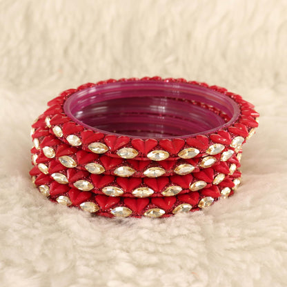 Magenta Sparkling stone detailing, and elegant golden Kada - Set Of 4