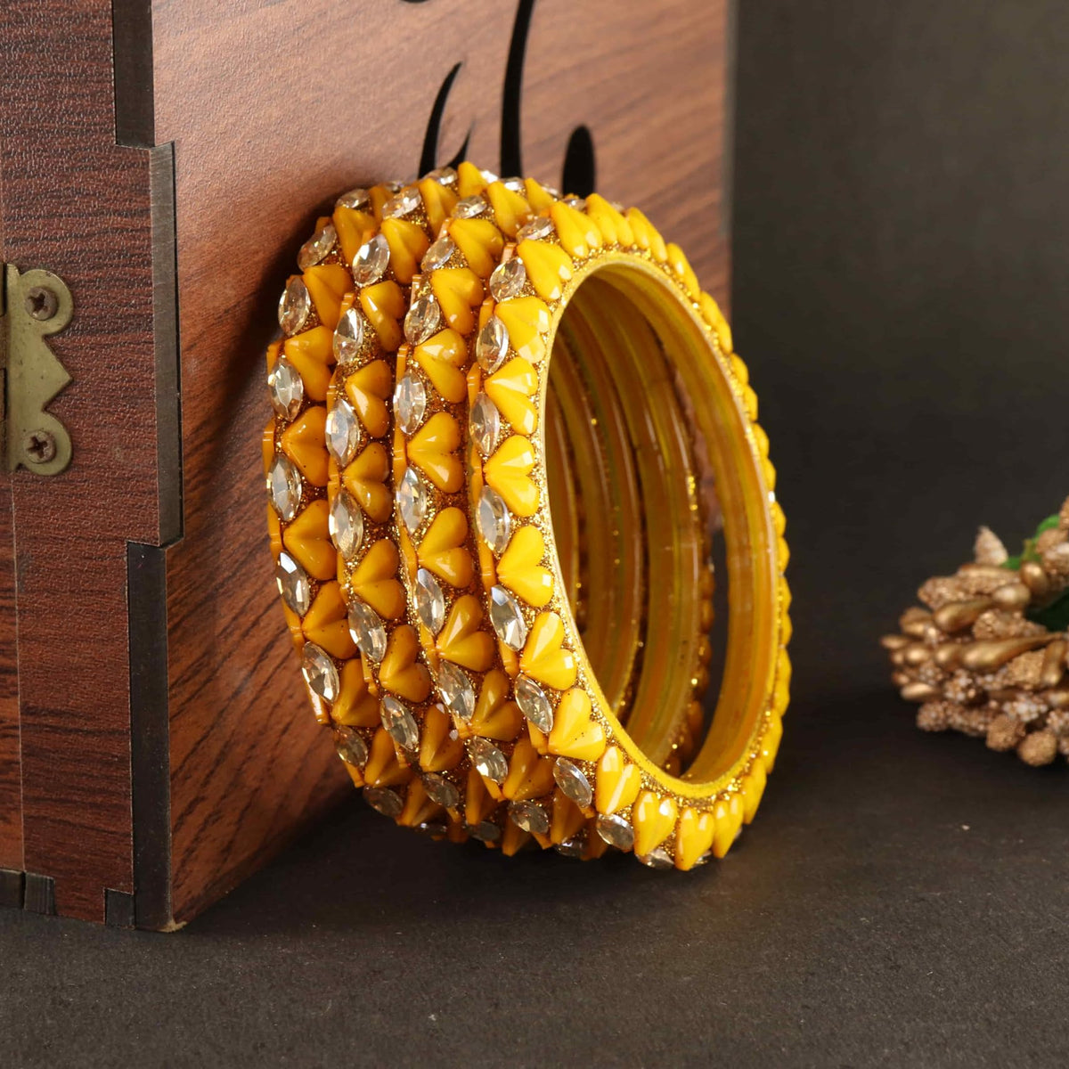 Yellow Sparkling stone detailing, and elegant golden Kada - Set Of 4