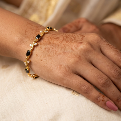 Elegant Gold-Toned Bracelet with Black Stone Stylish Designer Chain Bracelet for Daily & Party Wear
