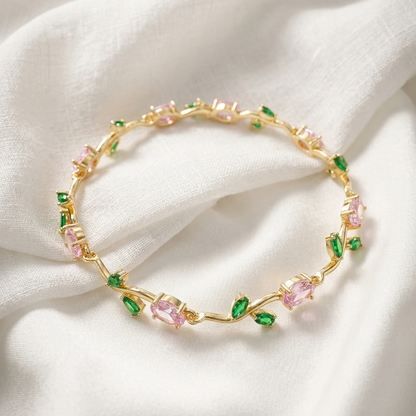Elegant Gold-Toned Bracelet with Pink Green Stones & Zircon Accents  Stylish Designer Chain Bracelet for Daily & Party Wear