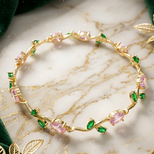 Elegant Gold-Toned Bracelet with Pink Green Stones & Zircon Accents  Stylish Designer Chain Bracelet for Daily & Party Wear