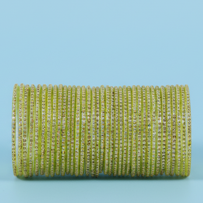 Dhani Green Glass Bangles with Golden Dots & Stone Work – Pack of 36