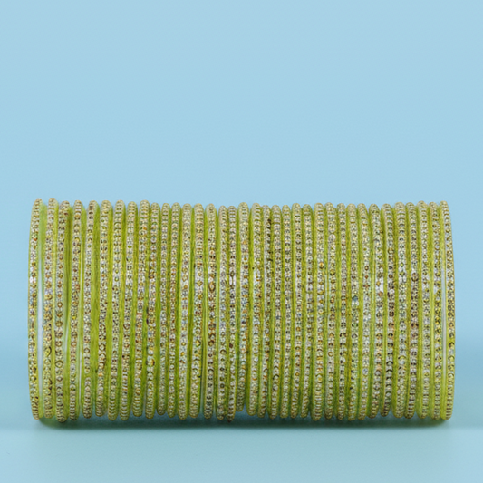 Dhani Green Glass Bangles with Golden Dots & Stone Work – Pack of 36