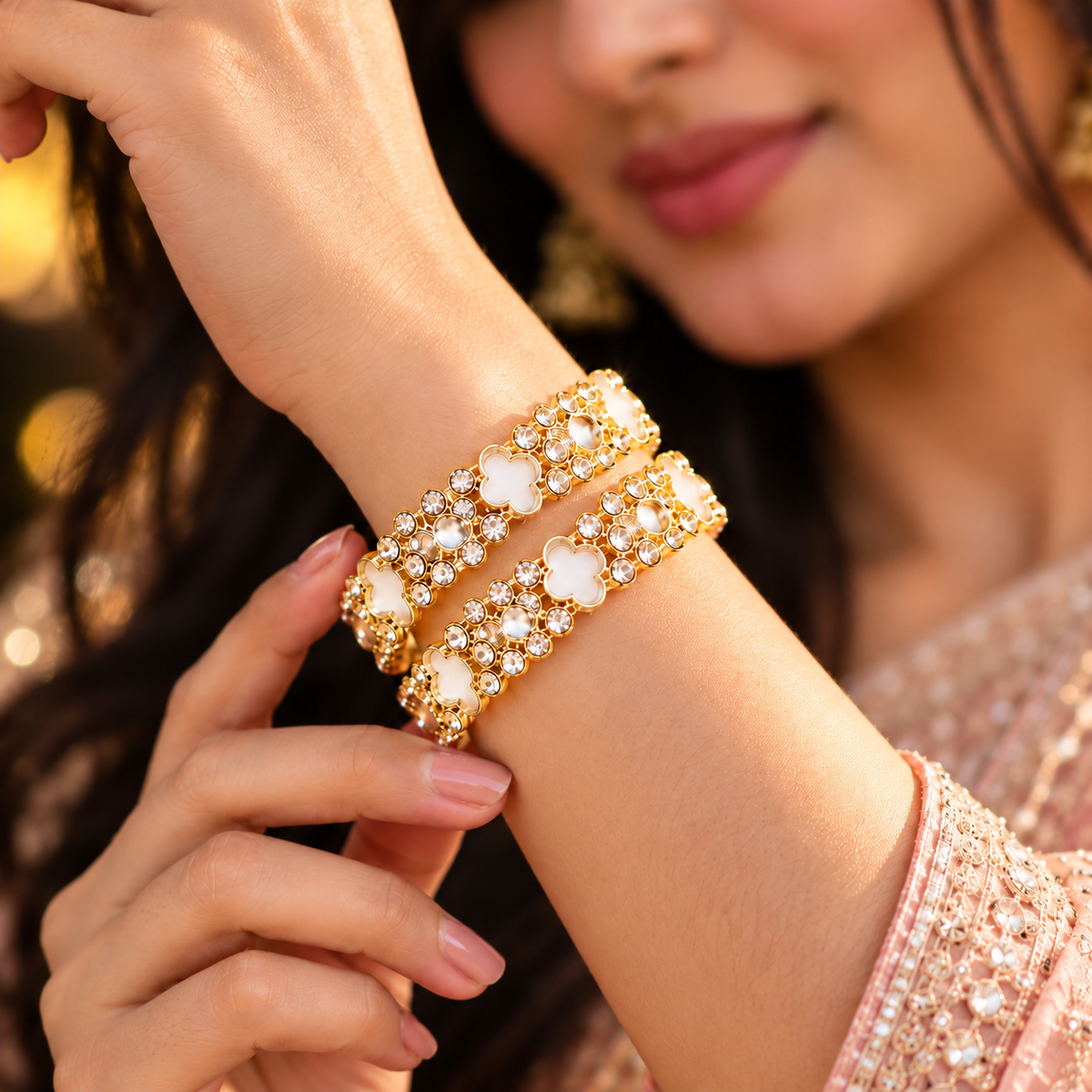 Elegant Golden Floral Bangles with Sparkling Crystal & Pearl Detailing - Set Of 4
