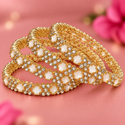 Elegant Golden Floral Bangles with Sparkling Crystal & Pearl Detailing - Set Of 4