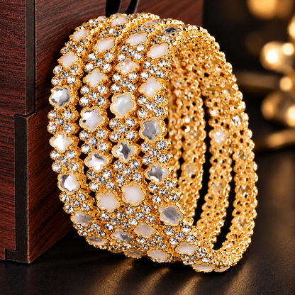 Elegant Golden Floral Bangles with Sparkling Crystal & Pearl Detailing - Set Of 4