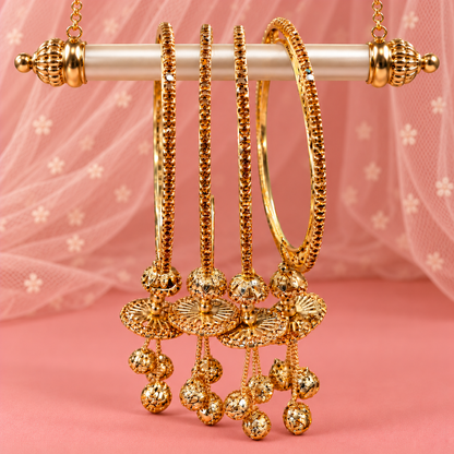 Designer Gold Plated Stone Studded with Latkan Charms Bangle Set - Set Of 4