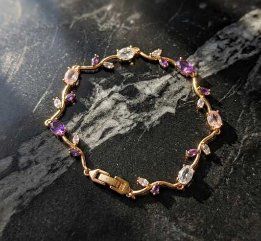 Elegant Gold-Toned Bracelet with White Purple Stone  Stylish Designer Chain Bracelet for Daily & Party Wear