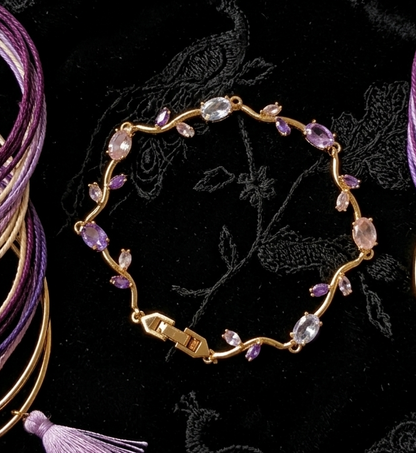 Elegant Gold-Toned Bracelet with White Purple Stone  Stylish Designer Chain Bracelet for Daily & Party Wear