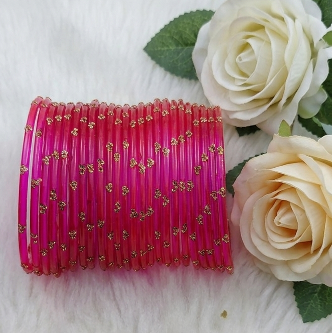 Traditional Magenta Stone Gold Bangles Set Glossy Finish with Golden Stone Work  Wear (Pack of 24)