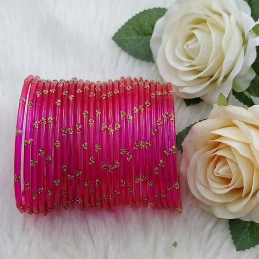 Traditional Magenta Stone Gold Bangles Set Glossy Finish with Golden Stone Work  Wear (Pack of 24)