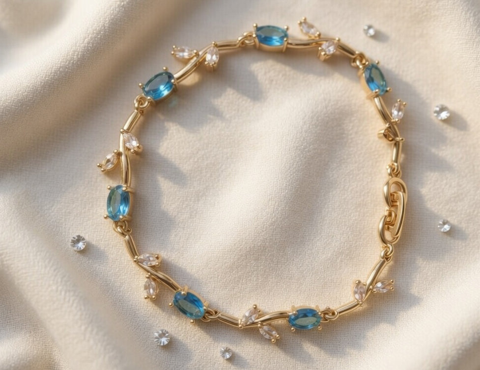 Elegant Gold-Toned Bracelet with SkyBlue Stone Stylish Designer Chain Bracelet for Daily & Party Wear