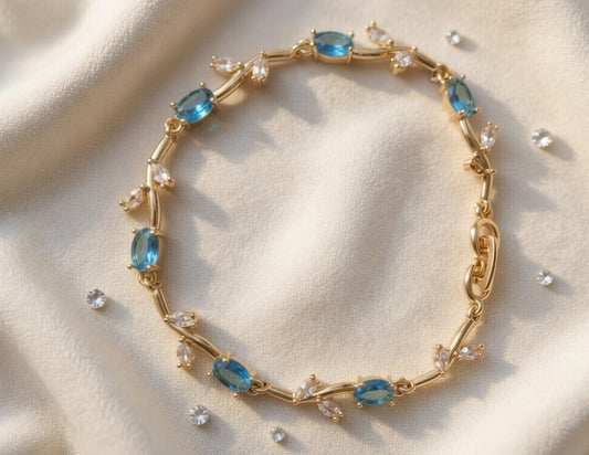 Elegant Gold-Toned Bracelet with SkyBlue Stone Stylish Designer Chain Bracelet for Daily & Party Wear