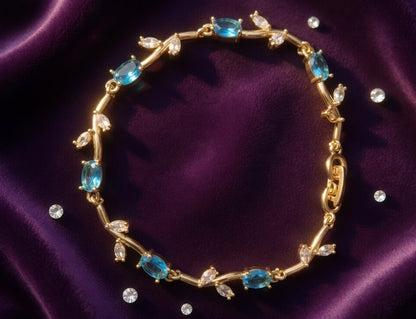 Elegant Gold-Toned Bracelet with SkyBlue Stone Stylish Designer Chain Bracelet for Daily & Party Wear