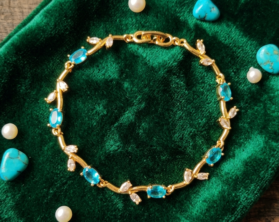 Elegant Gold-Toned Bracelet with SkyBlue Stone Stylish Designer Chain Bracelet for Daily & Party Wear